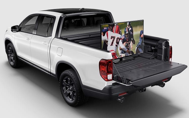 2026 Honda Ridgeline Black Edition in Platinum White Pearl with Two-Tone Roof​, showing dual action tailgate.